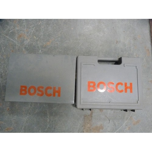 338A - Bosch hammer drill and a Bosch angle grinder.