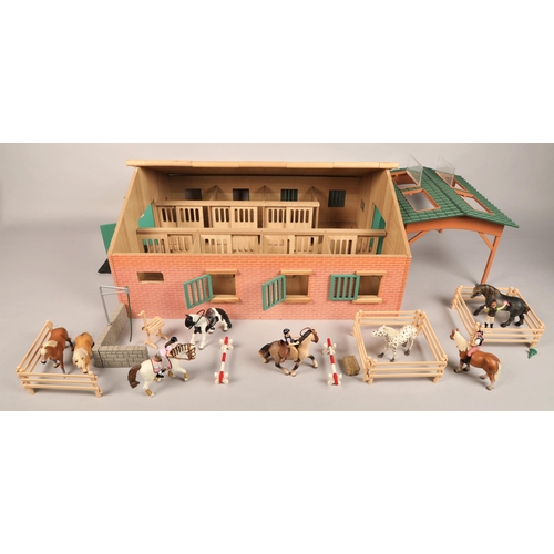 300 - Large childrens play stable containing Schleich figures incl retired horses, fences, accessories, et... 