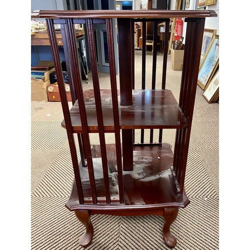 557 - Revolving mahogany book case