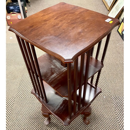 557 - Revolving mahogany book case