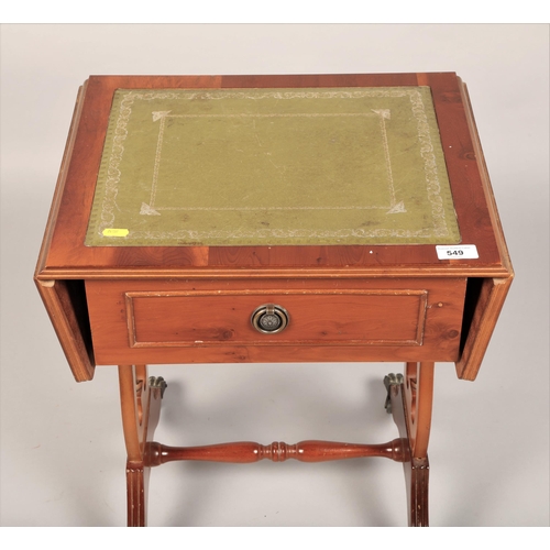 549 - Drop leaf yew side table, with green leather embossed top 