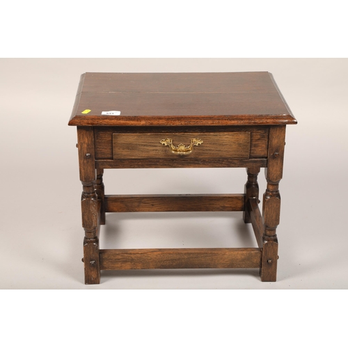 551 - Small oak occasional table with single drawer