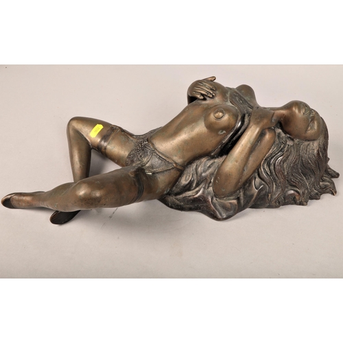 35 - Bronze statue of a reclining lady, 49 cm long