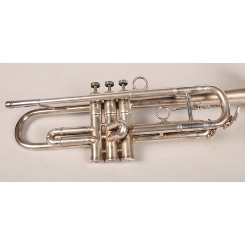 387 - Besson classe A trumpet, seriel number 292162, with three mouth pieces in case