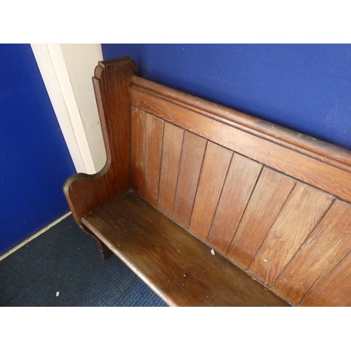 394 - Antique pitch pine pew, boarded back & solid seat, 277cms long.