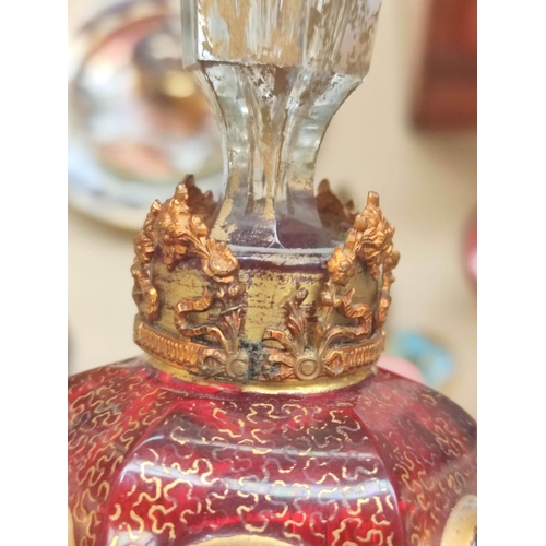 182 - Bohemian glassware to include a large cranberry glass vase with applied gilt decoration 30cm high, a... 