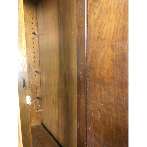 573 - Early 20th century Oak glazed book case over cupboard, 183 x 215 x 46 cm