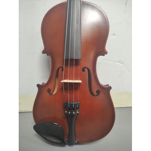 69 - Modern 3/4 size violin unattributed. Oil varnished spruce top and two piece maple back. Complete wit... 