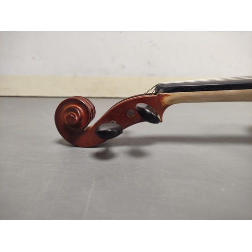 69 - Modern 3/4 size violin unattributed. Oil varnished spruce top and two piece maple back. Complete wit... 