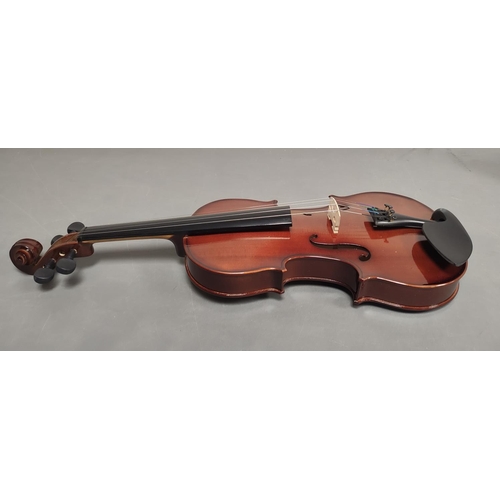 70 - Modern 4/4 size violin unattributed. Spruce top and two piece maple back. Complete with case and bow... 