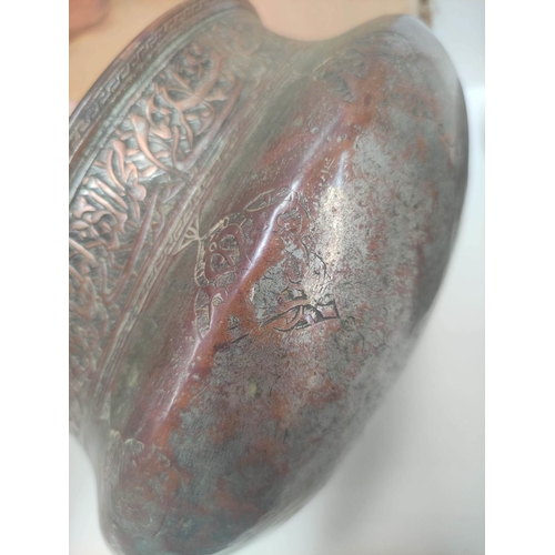 347 - Eastern copper ware, mainly of Indian origin to include vases, a charger decorated with deities in r... 