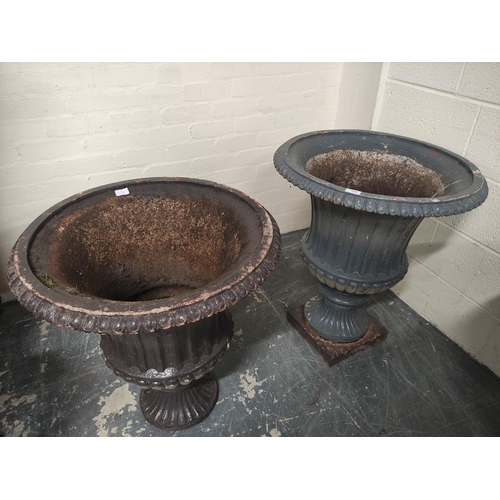 379 - Pair of antique cast iron campagna form garden urns of large size, each with formerly painted lunett... 