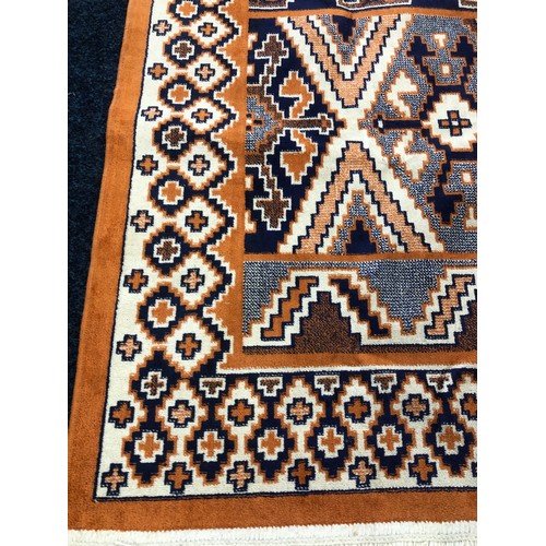 563 - Flat weave rug, orange and blues, geometric design, 185 x 138cm