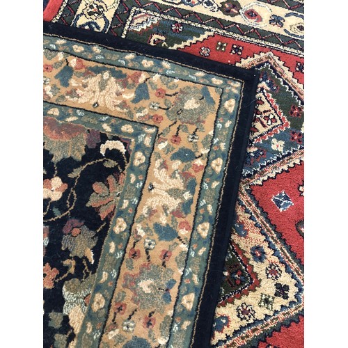 564 - Pair of rugs with foliate design, 225 x 160cm, and another.