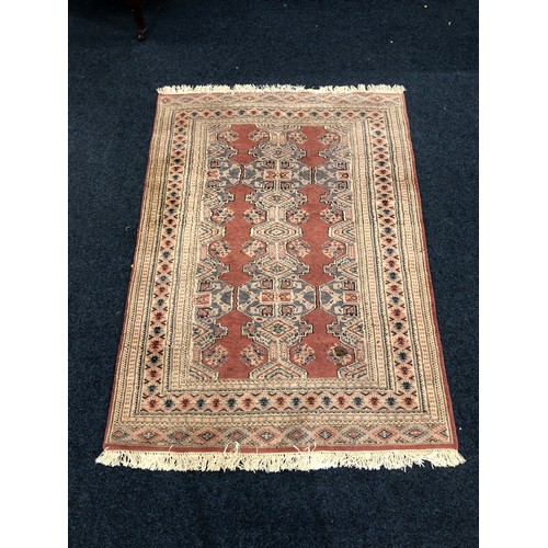 569 - Caucasian rug with overall geometric design, 128 x 175cm.