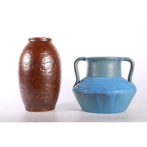 14 - Studio Pottery Candy Ware twin-handled vase, 15cm, and another West German vase, 20cm.  (2)