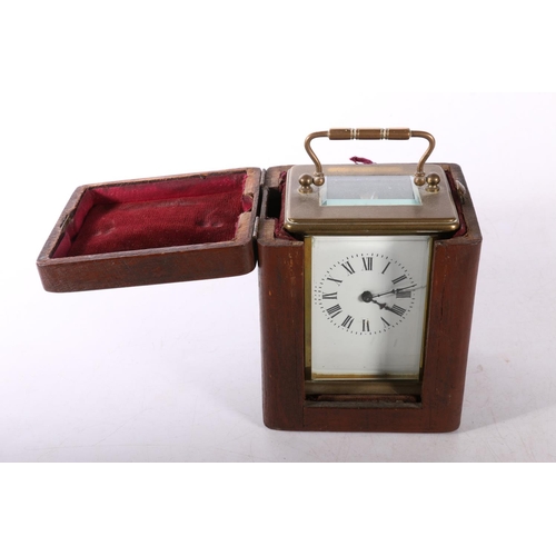 26B - Antique French brass carriage clock in fitted case.