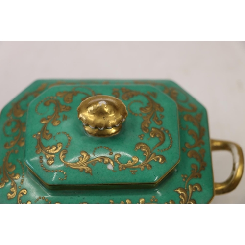 40 - Continental teapot, 15cm, and covered sugar bowl, with gilt decoration.