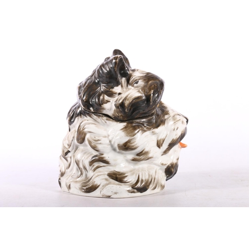 50F - Novelty tobacco jar in the form of a dog.