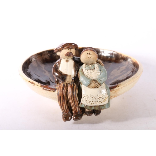 50H - Flockfield pottery dish with couple over the edge.