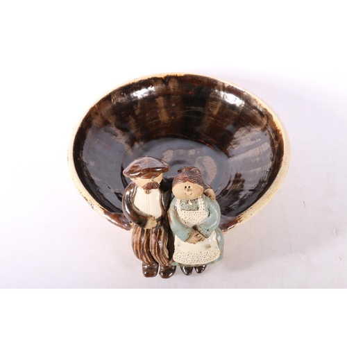 50H - Flockfield pottery dish with couple over the edge.