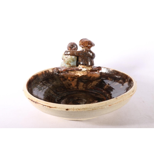 50H - Flockfield pottery dish with couple over the edge.