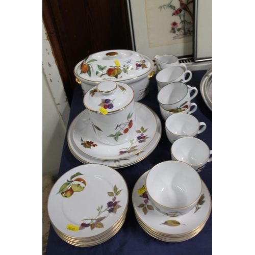 107 - Royal Worcester Evesham tureen, plates, cups, a canister, etc.