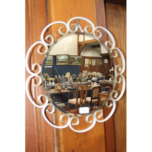 570 - Circular wall mirror with bevelled frame and metal frame. 47 dia.