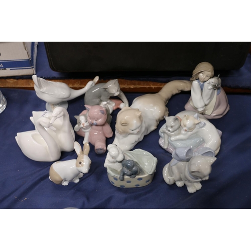 74 - Nine Nao figures to include cats, dogs, birds, etc. and a Coalport figurine.