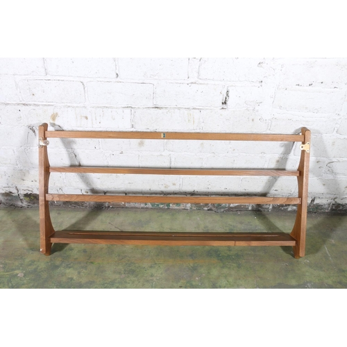 571 - Ercol blonde tone two-tier wall mountable plate rack, 96cm long.