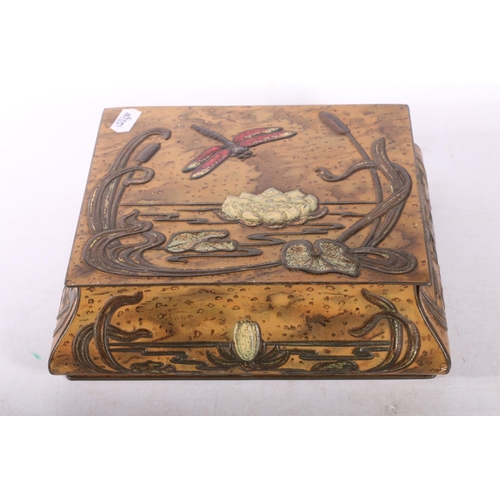 113 - Art Nouveau decorated hinged biscuit tin, 7cm high.