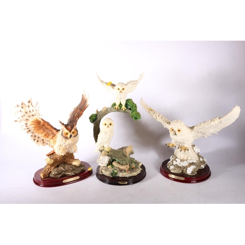 116 - Three resin models of owls, larges 38cm.