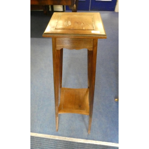 483 - Two tier mahogany pot stand.