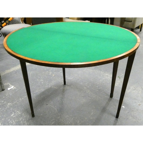 434 - Georgian mahogany card table with crossbanding raised on square tapering supports 91cm.