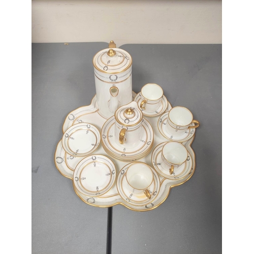 12 - Aynsley part coffee set on scalloped edge porcelain tray with gilded rims, handles and laurel leaf b... 