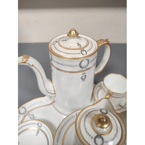 12 - Aynsley part coffee set on scalloped edge porcelain tray with gilded rims, handles and laurel leaf b... 