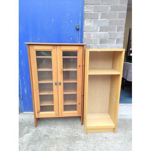 408 - Pine glazed two door cabinet 111cm high and a laminate open bookcase.