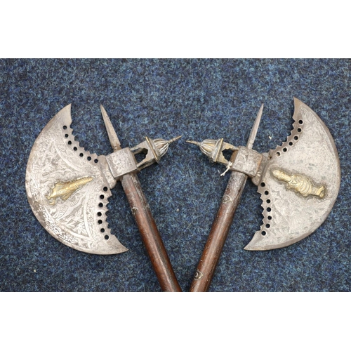 742 - Pair of Indo-Persian ceremonial tabar or saddle axes, the blade decorated with figures picked out in... 