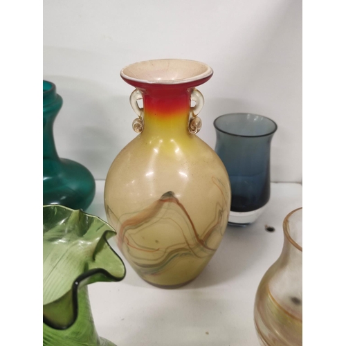 104 - Collection of coloured glass to include vases, etc.