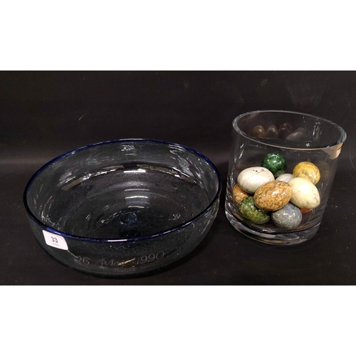 33 - Circular glass cylindrical vase, a similar bowl and a quantity of hardstone eggs, a Crescent ware bi... 