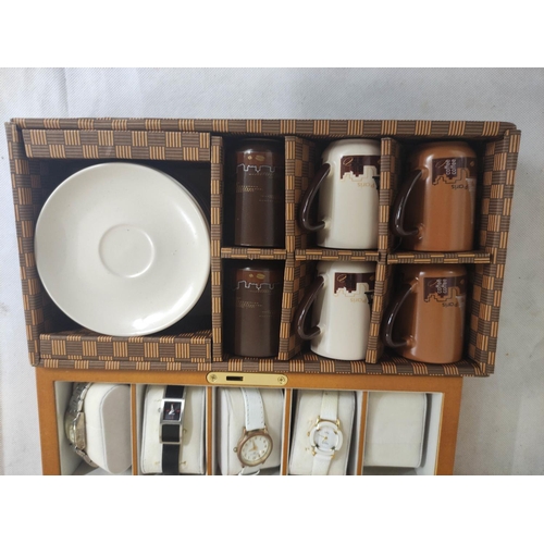 57 - Collection of lady's fashion watches and a boxed coffee set.