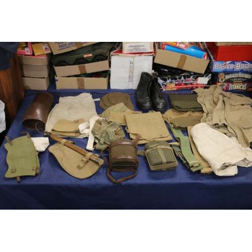 777 - Collection of army uniform and accessories including an entrenching tool, two cloth covered water bo... 