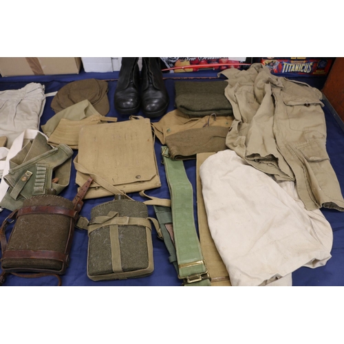 777 - Collection of army uniform and accessories including an entrenching tool, two cloth covered water bo... 