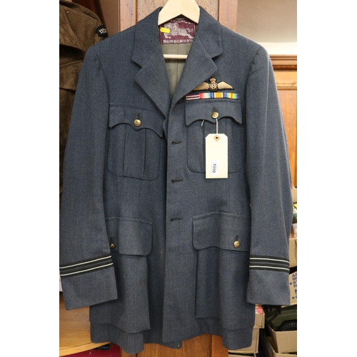 779 - British Royal Air Force uniform, a jacket with Burberrys label having needlework RAF pilot wings bre... 