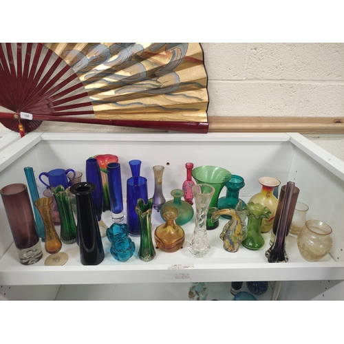 104 - Collection of coloured glass to include vases, etc.