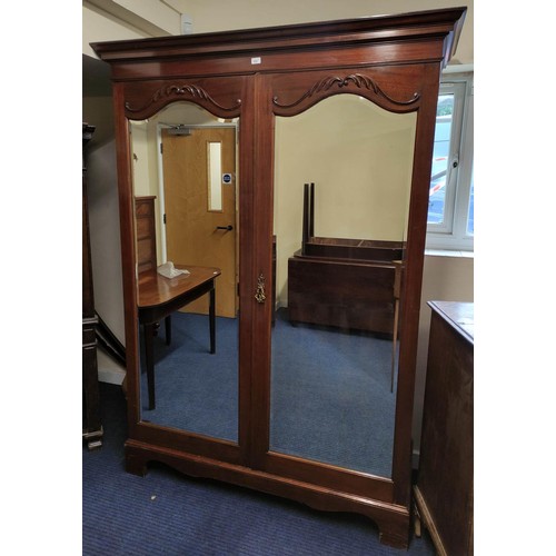 514 - Victorian mahogany two door wardrobe, 138cm.