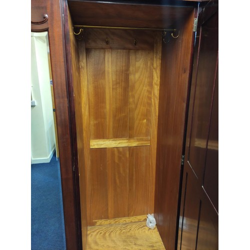 514 - Victorian mahogany two door wardrobe, 138cm.