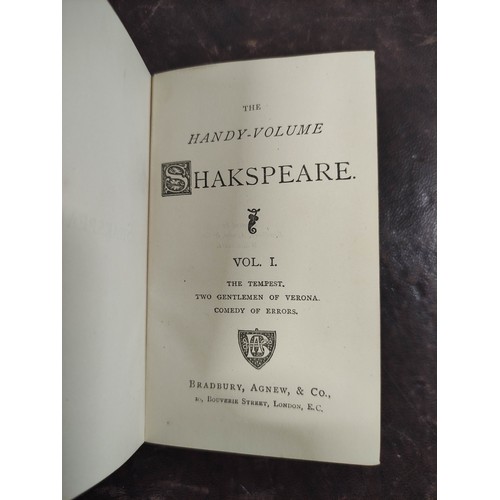 9 - SHAKESPEARE WILLIAM.  The Handy-Volume Shakespeare. 13 vols. Small format. Limp red morocco, gilt ba... 