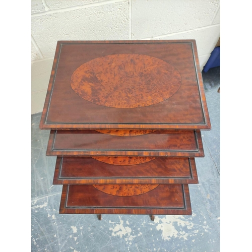 569 - 19th century mahogany nest of quartetto tables, the graduated tables, raised on turned supports and ... 