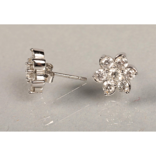 104 - White metal and white stone cluster earrings